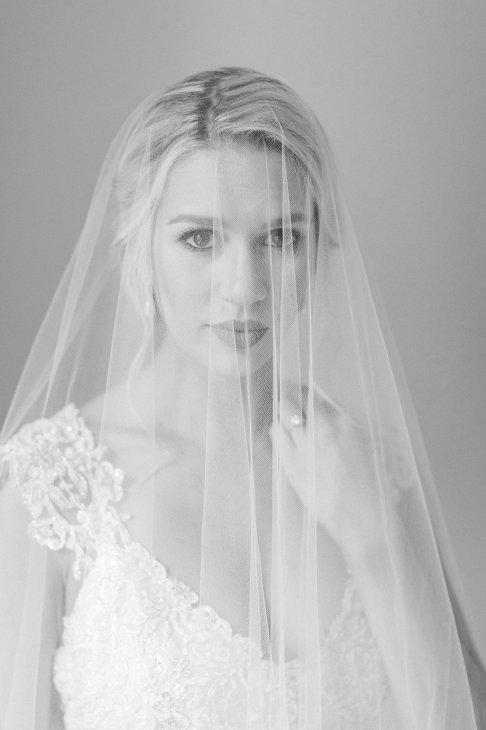 black and white portrait of a bride wearing Anna Campbell wedding dress
