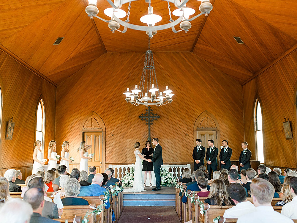 wedding ceremony at Old St. Hilary's Chapel in Tiberon, California