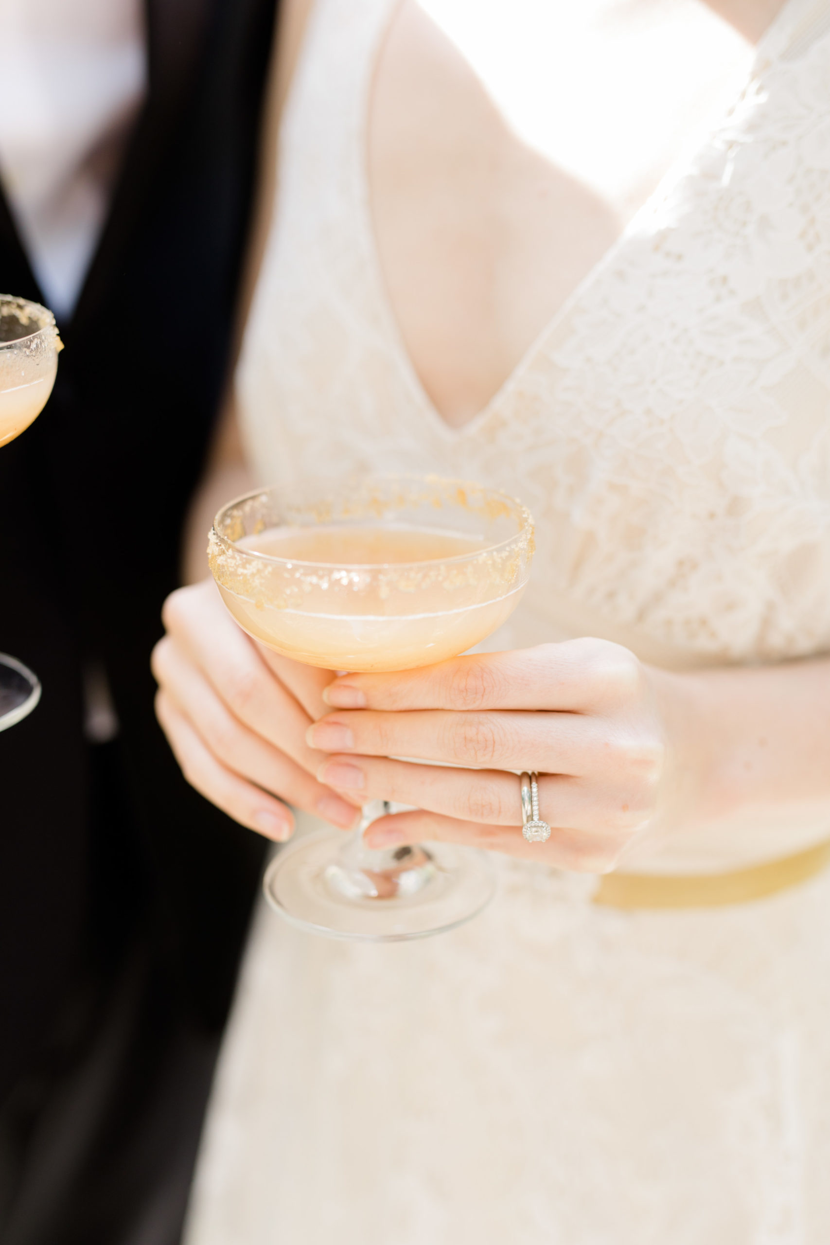 Bride holding a cocktail with a salted rim