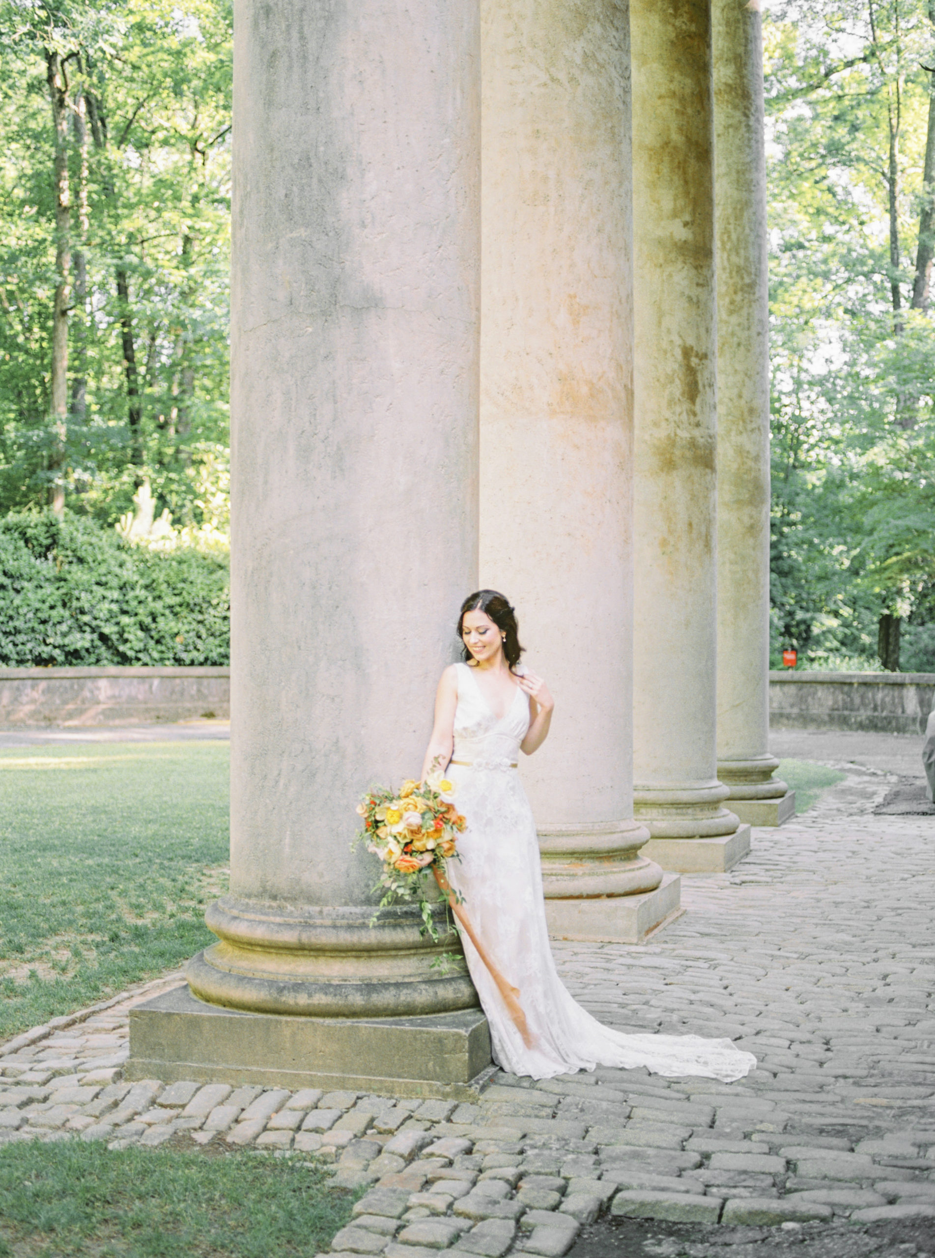 Bridal portrait in front of the Swan House columns