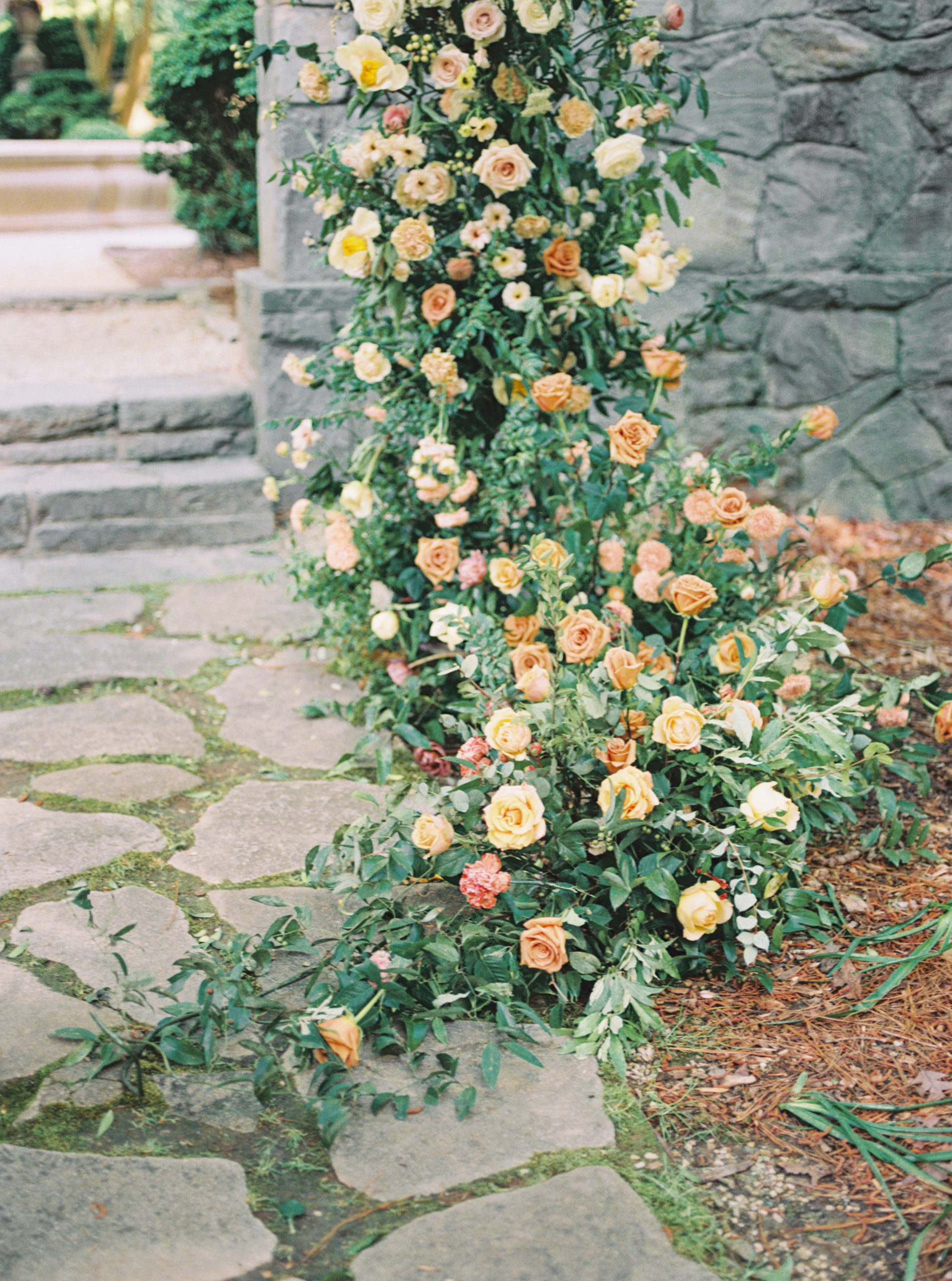 orange, pink and yellow floral inspiration for a garden wedding ceremony