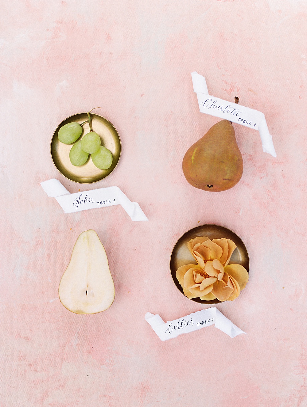 Pears and name cards wedding flatlay