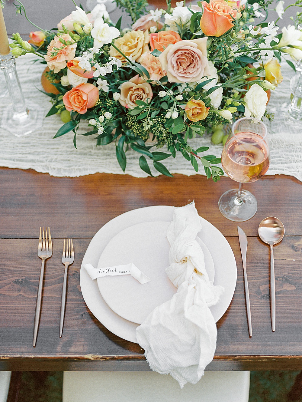 blush orange and yellow florals for wedding reception