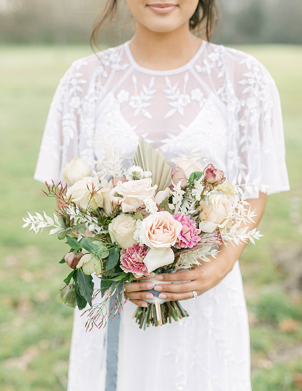 Blush and neutral wedding bouquet with palm fronds for an Atlanta elopement