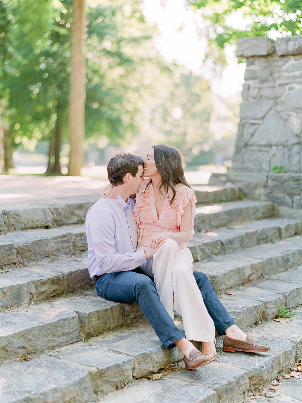 Engagement portrait on the steps of Piedmont Park