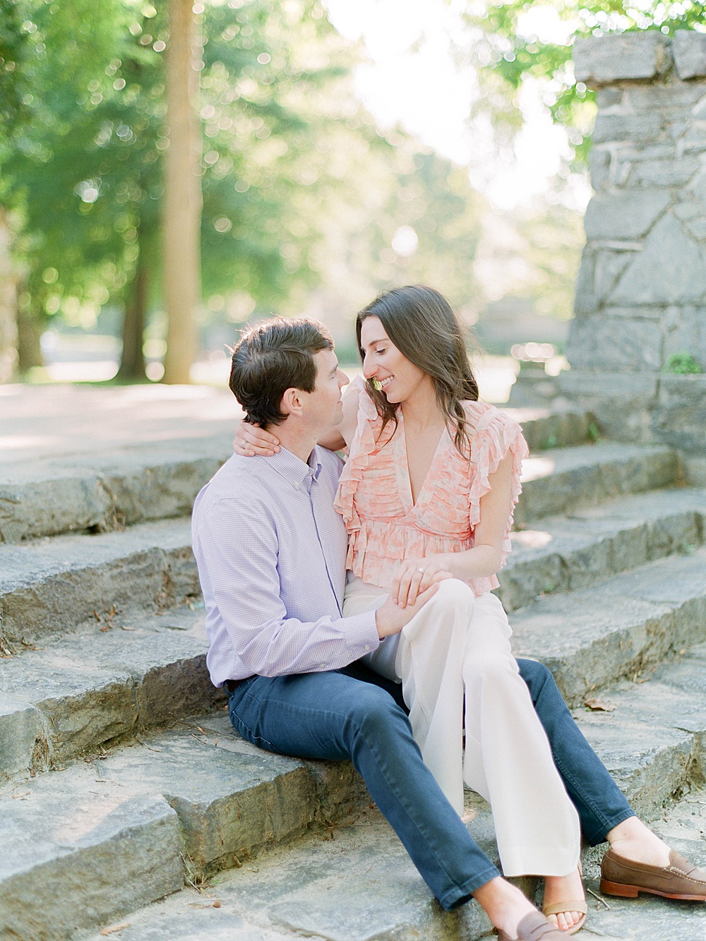 Engagement portrait on Piedmont Park stone steps
