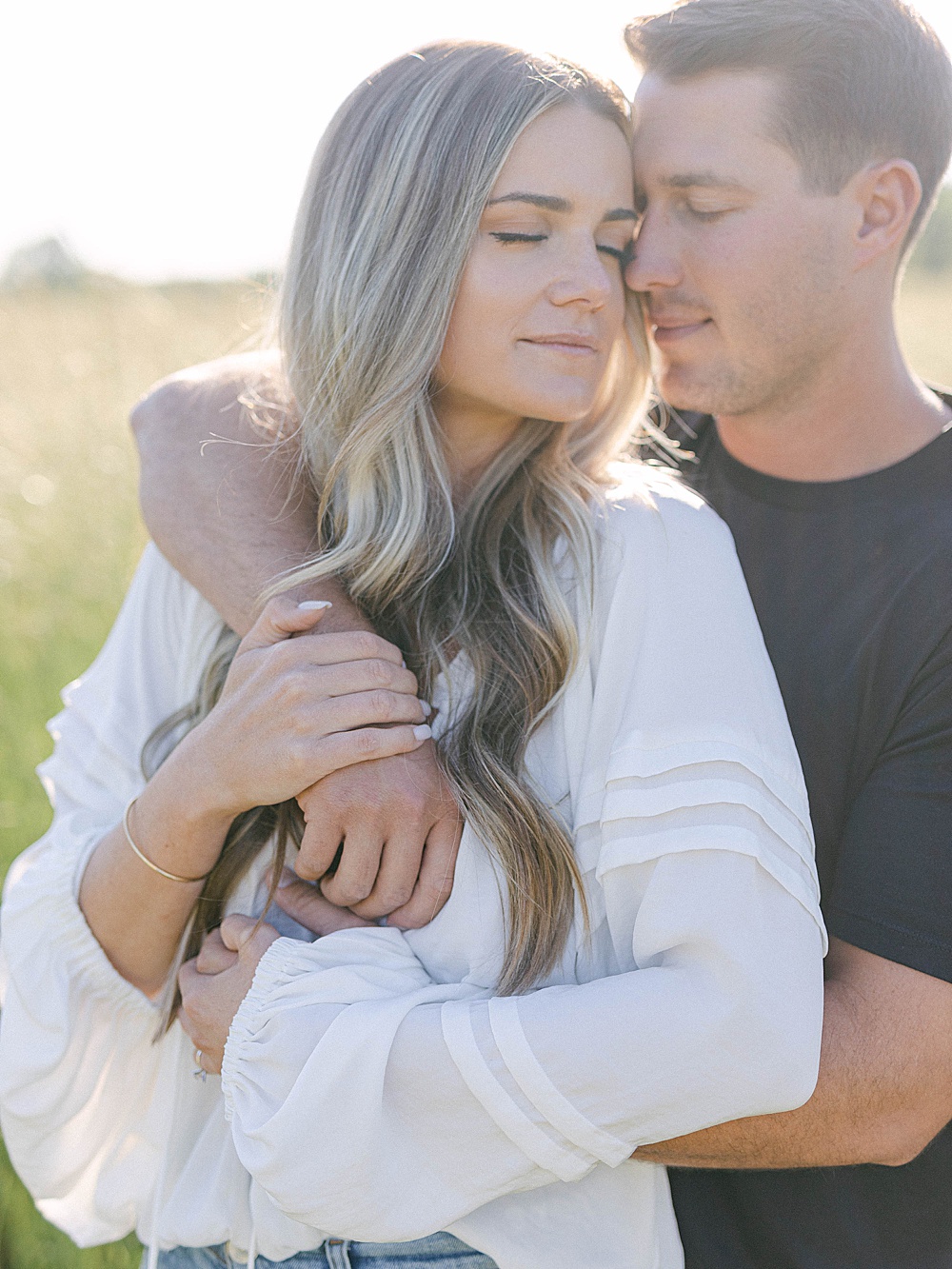 Altanta engagement photography in a field captured by Film Photographer Laura Watson