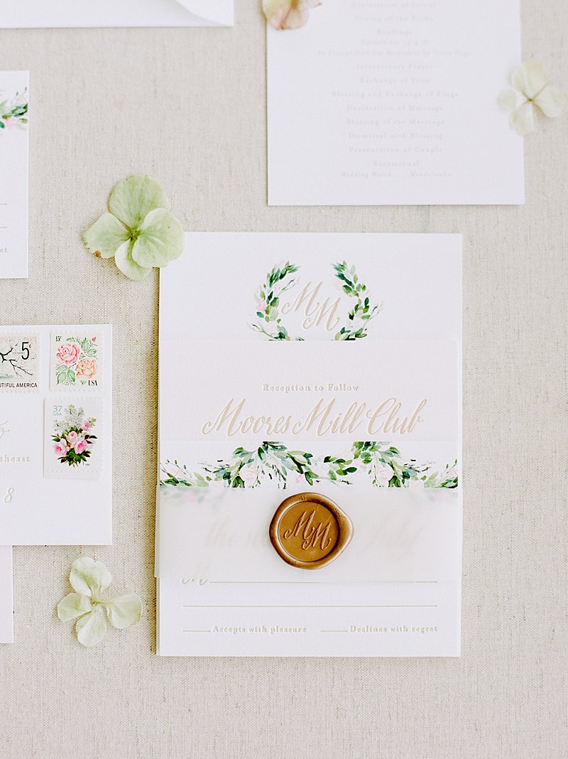 Letter press wedding invitation with a custom crest