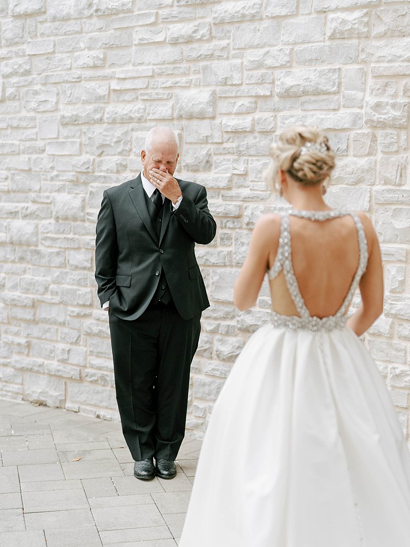Father daughter first look on a wedding day