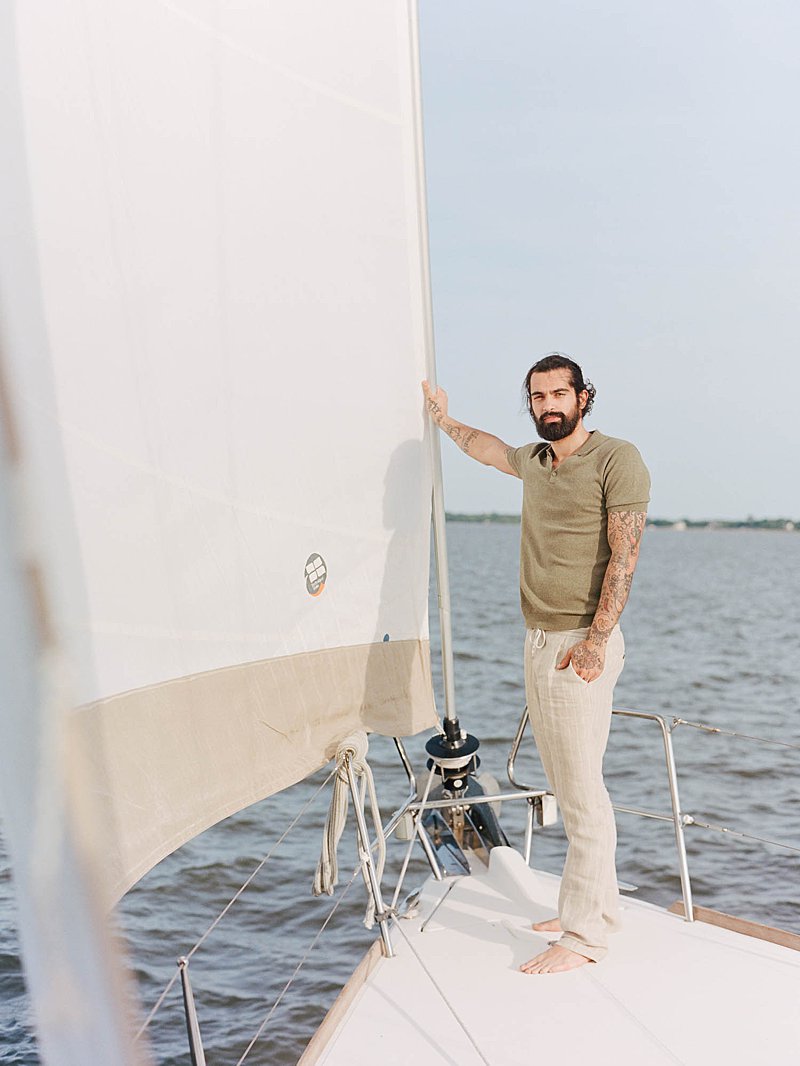 Groom portrait on a sailboat