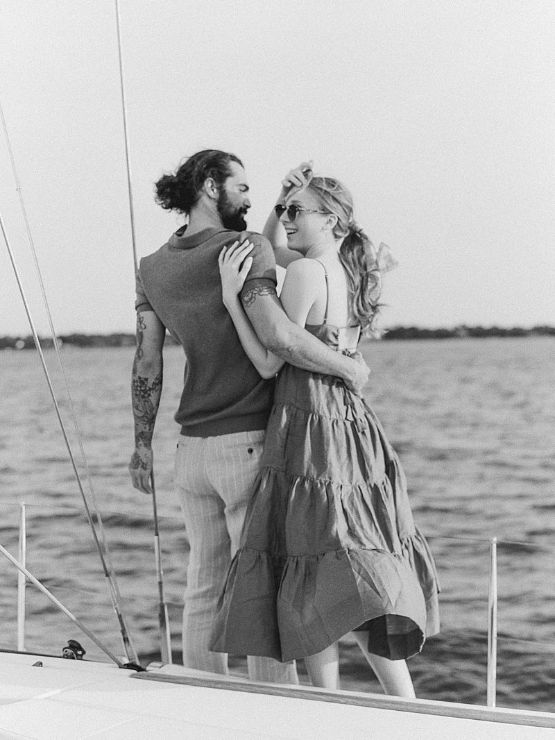 Engagement session at Charleston Harbor on a sailing yacht