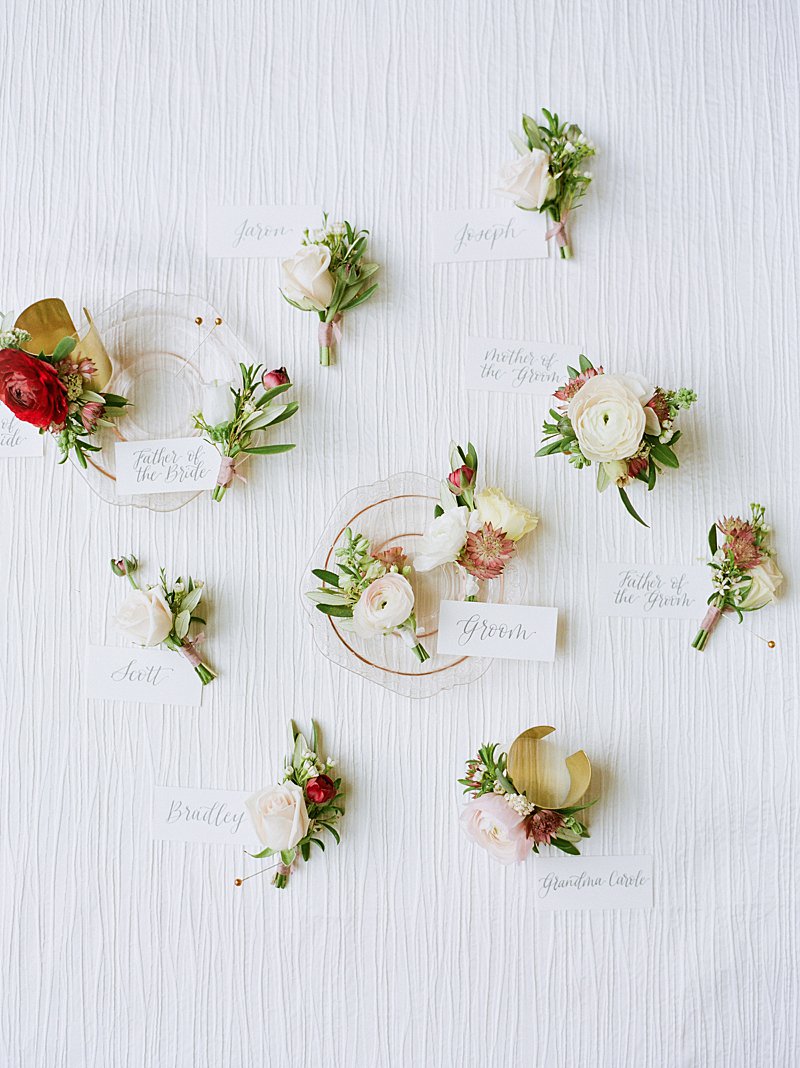 Floral boutonnieres for a Chateau Elan Wedding