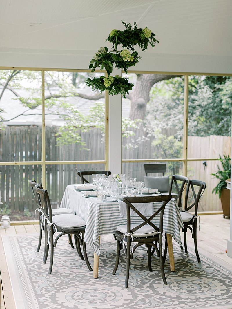 Intimate dinner table set for a backyard wedding