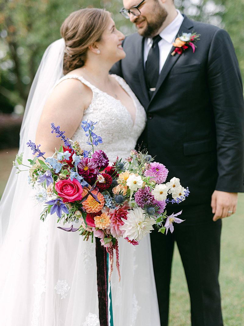 Jewel toned wedding bouquet with dahlias