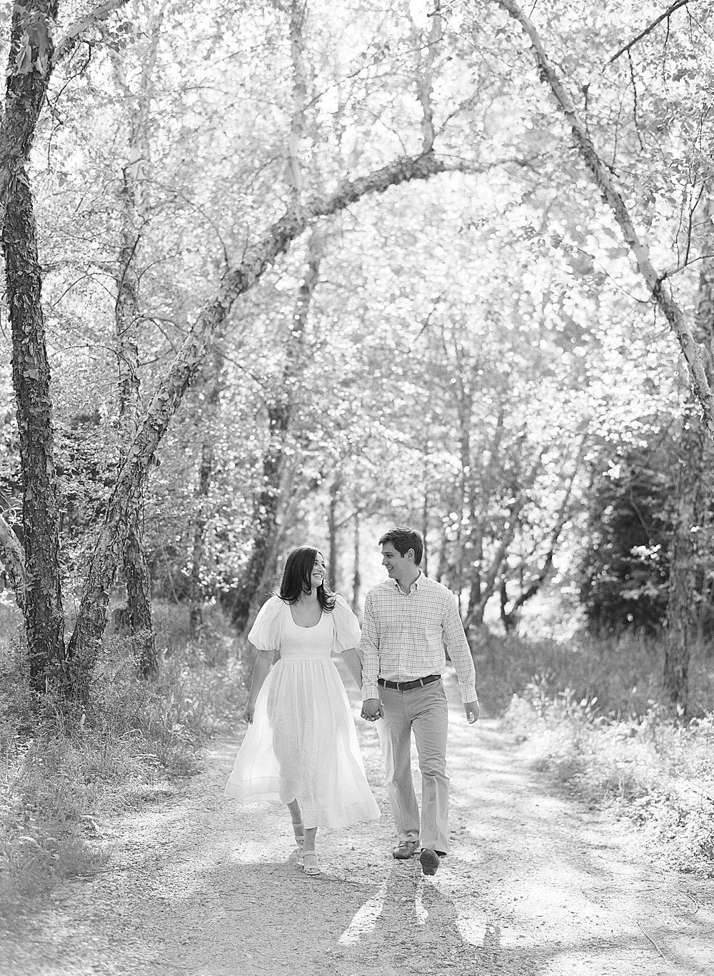 Black and white engagement photo, captured on film by Laura Watson Photography
