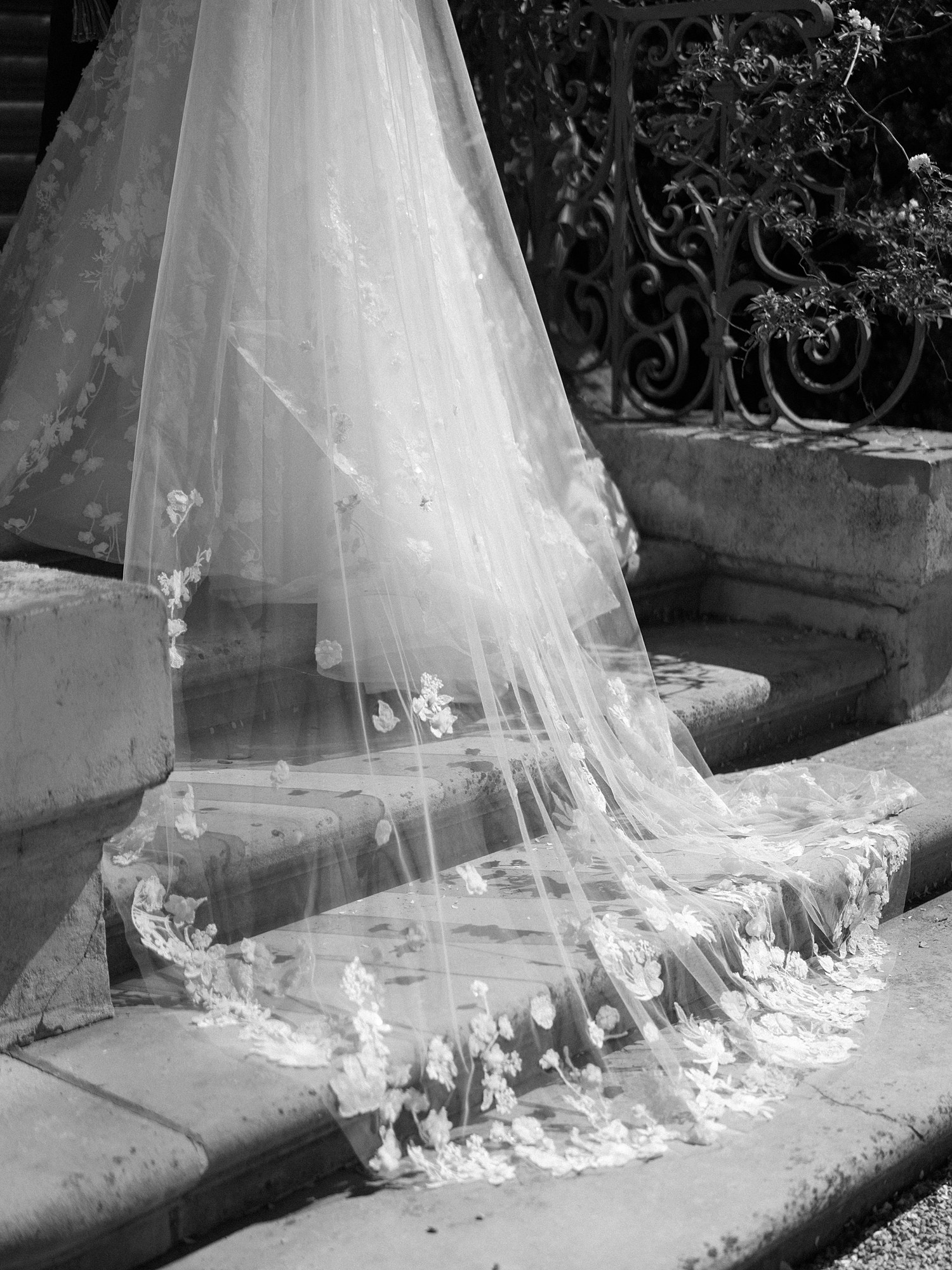 A black and white detail photo of the bride's veil