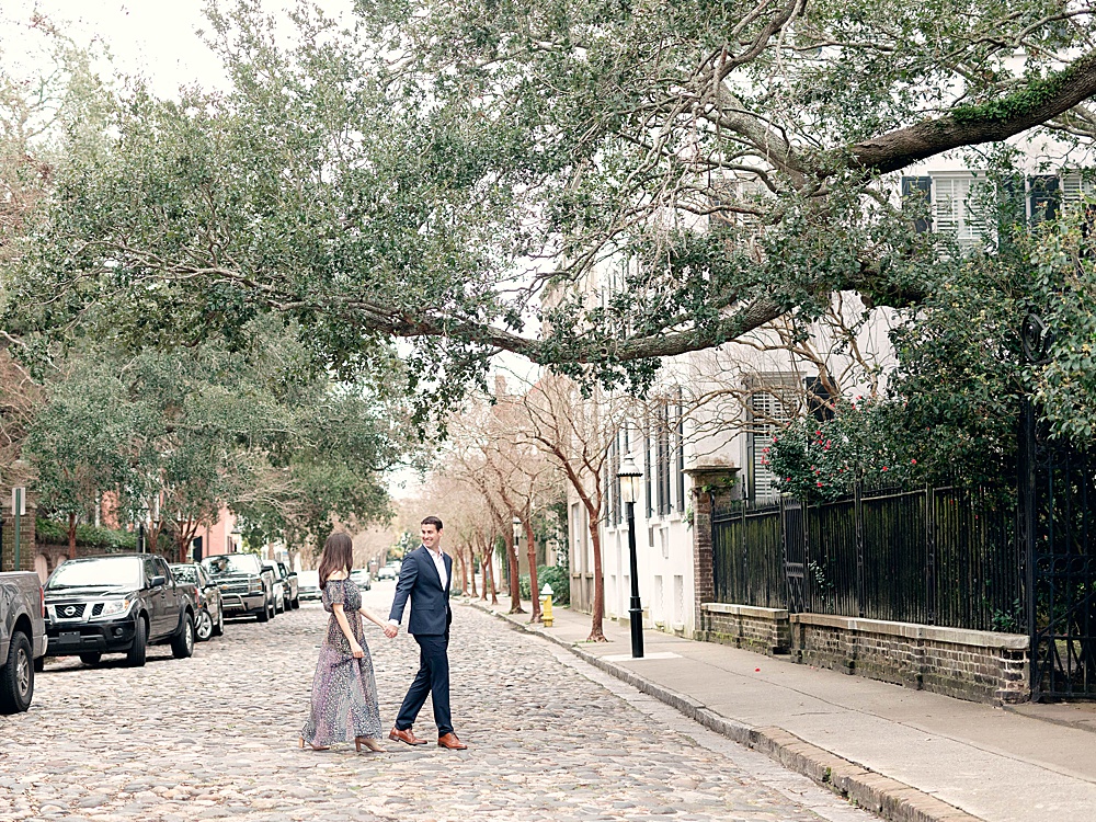 Engagement photos taken on Chalmers Street in Charleston