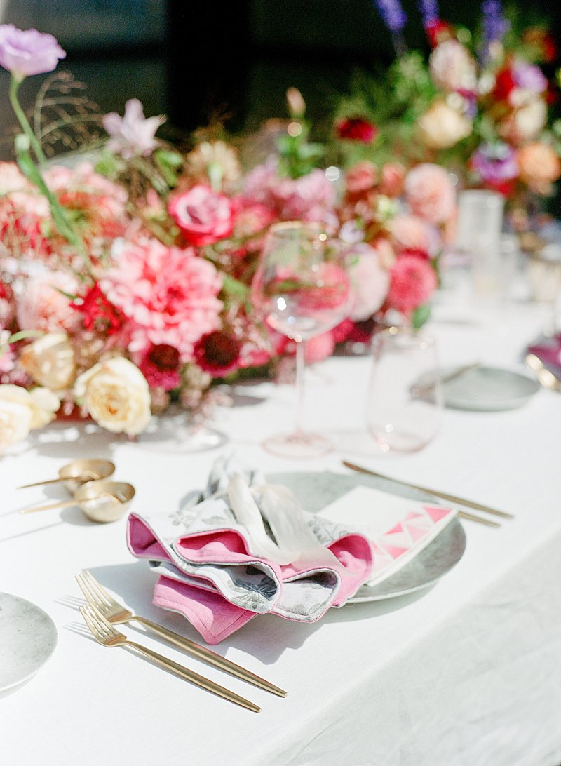 Pink wedding palette with gray plates from Table Made Co