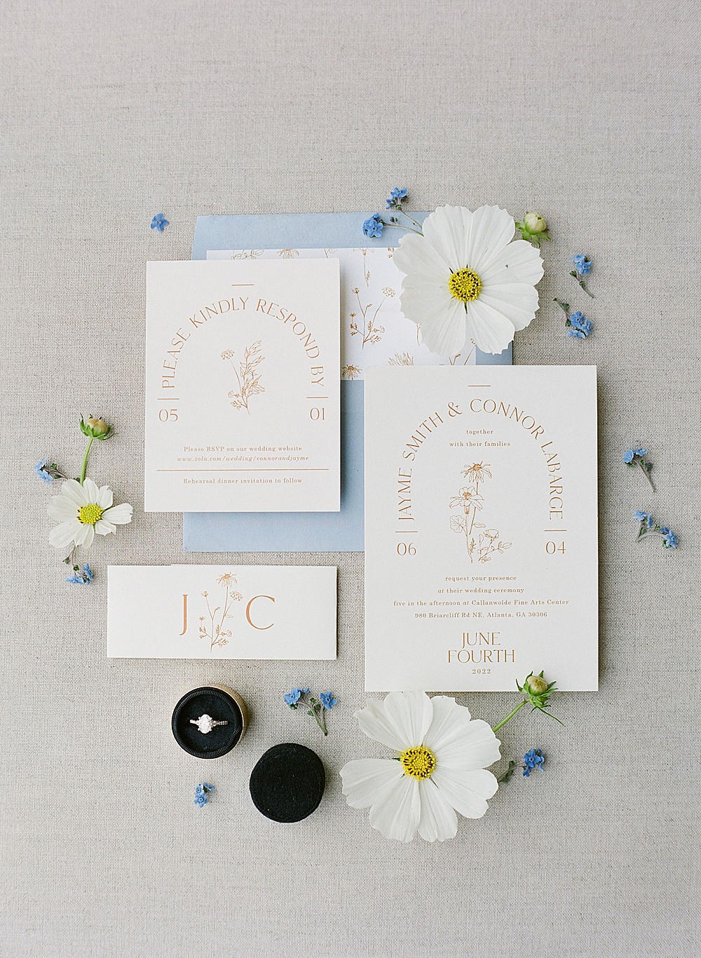 Blue and yellow invitation suite with daisies for a wedding day